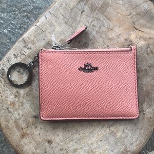 Coach coin purse and card holder with key chain.